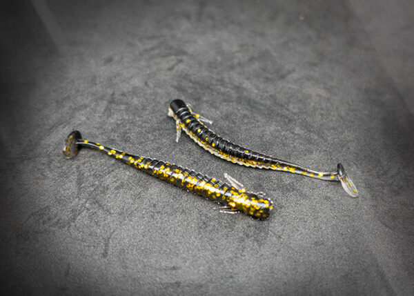 Gummifisch Gummiköder Angelköder in der Farbe Schwarz/Gold/Glitter